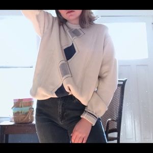 sweater with an argyle pattern down the center.